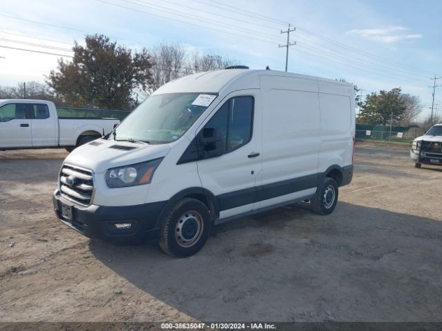 Photo 1 VIN: 1FTYE1C87LKA16328 - FORD TRANSIT-150 CARGO VAN 