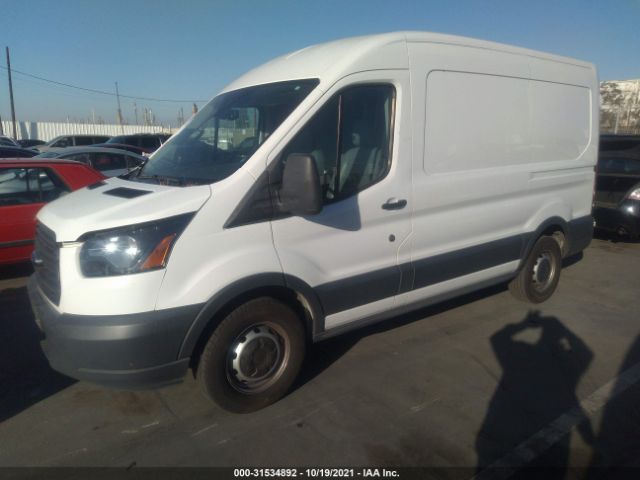 Photo 1 VIN: 1FTYE1CM5JKB29138 - FORD TRANSIT VAN 