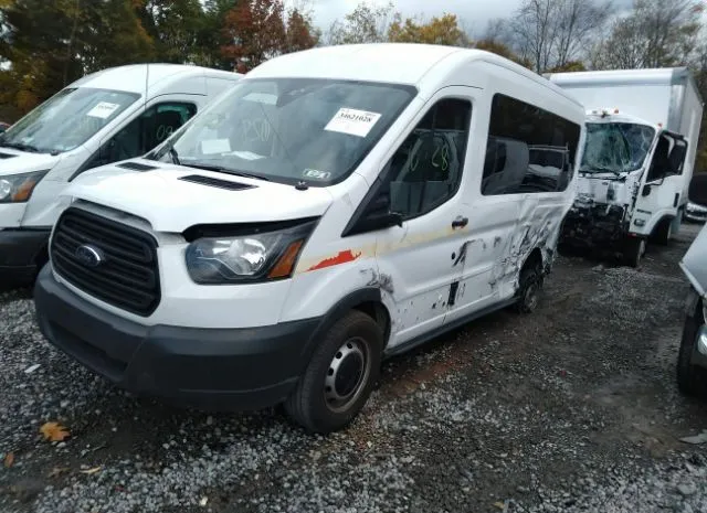 Photo 1 VIN: 1FTYE1CM7GKA66083 - FORD TRANSIT CARGO VAN 