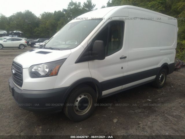 Photo 1 VIN: 1FTYE1CM9JKA33657 - FORD TRANSIT VAN 