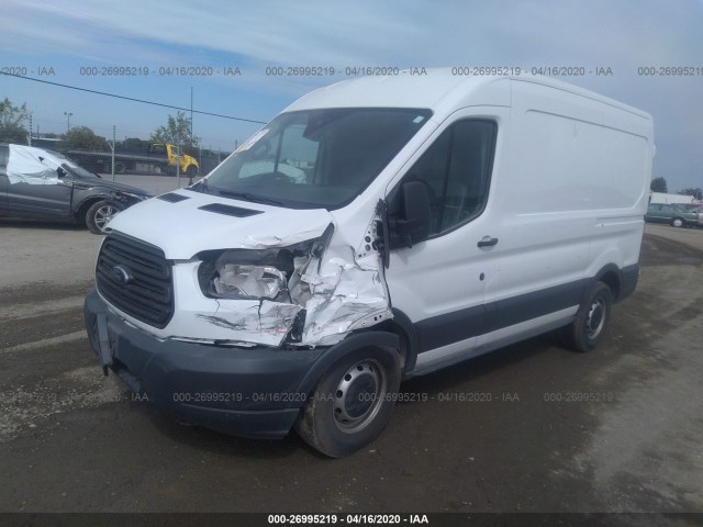 Photo 1 VIN: 1FTYE1CMXGKA67597 - FORD TRANSIT CARGO VAN 