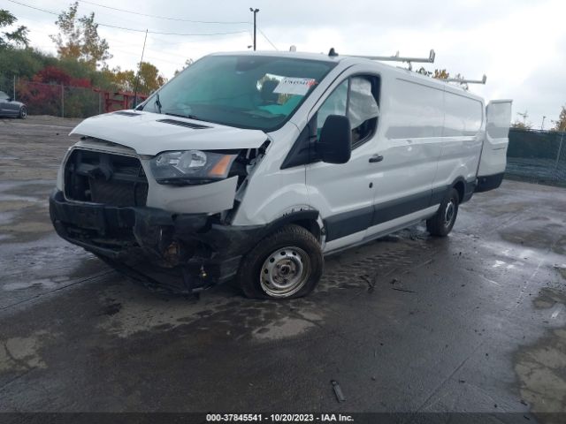 Photo 1 VIN: 1FTYE1Y82LKA70497 - FORD TRANSIT-150 CARGO VAN 