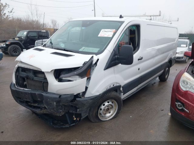 Photo 1 VIN: 1FTYE1Y82LKA70497 - FORD TRANSIT-150 CARGO VAN 