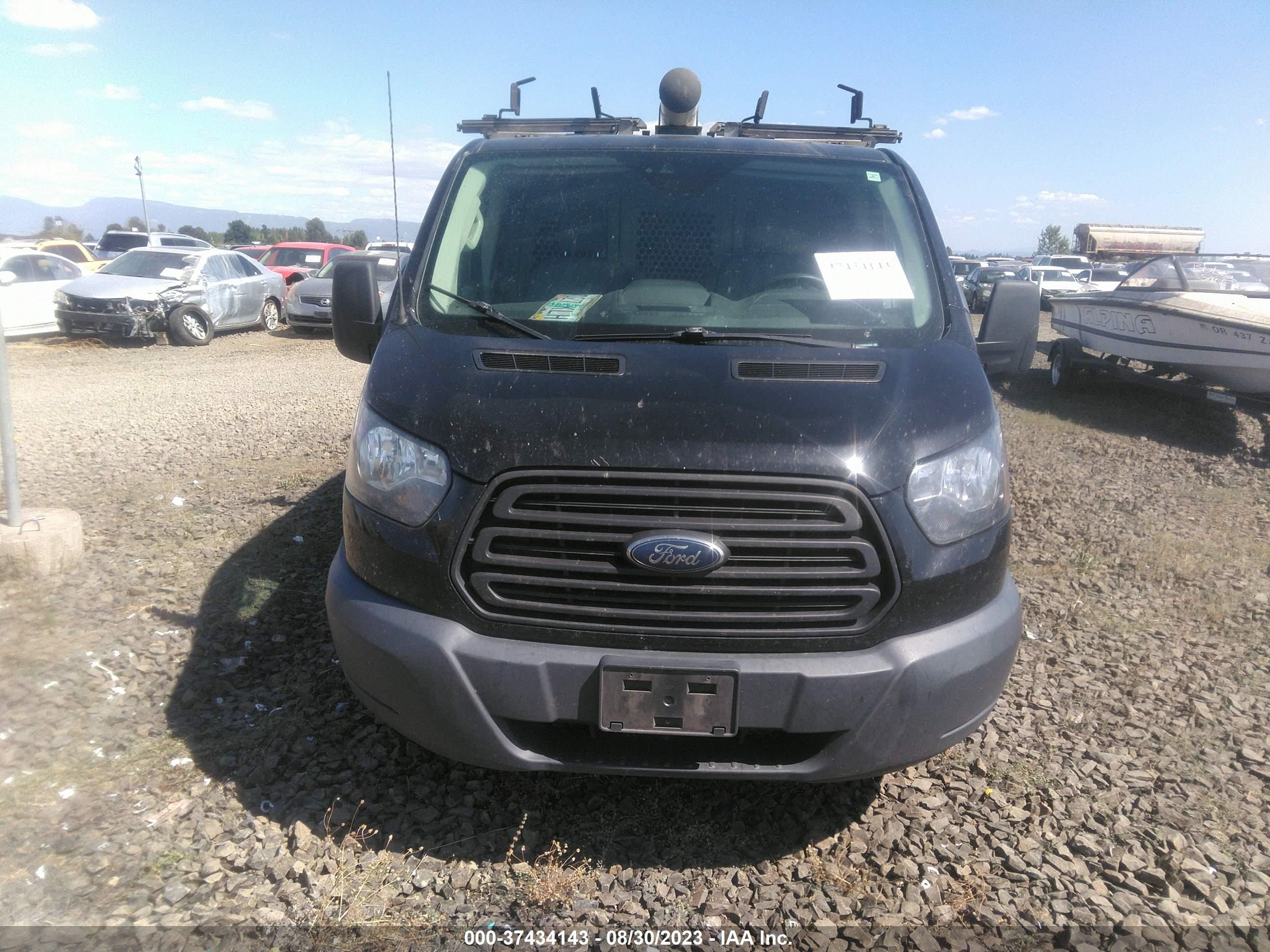 Photo 11 VIN: 1FTYE1YM2JKA11640 - FORD TRANSIT 