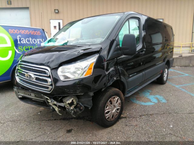 Photo 1 VIN: 1FTYE1YMXJKA38486 - FORD TRANSIT VAN 