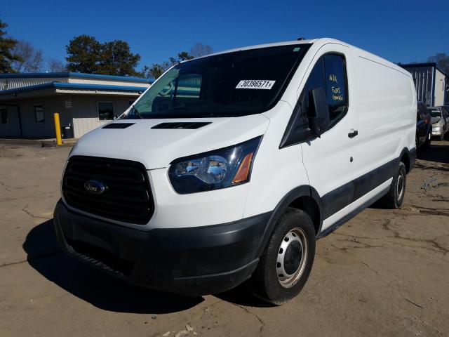 Photo 1 VIN: 1FTYE1YMXKKA80187 - FORD TRANSIT VAN 