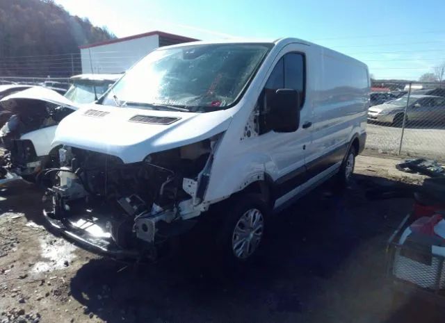 Photo 1 VIN: 1FTYE1ZM3GKA00721 - FORD TRANSIT CARGO VAN 