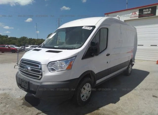 Photo 1 VIN: 1FTYE2CM0JKB22216 - FORD TRANSIT VAN 