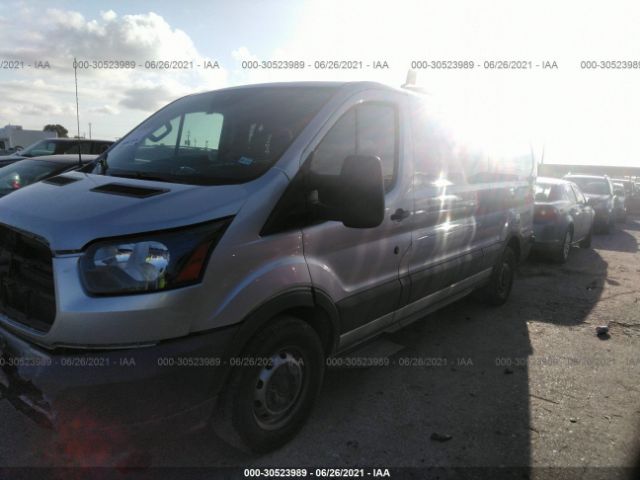 Photo 1 VIN: 1FTYE2YM5JKA80697 - FORD TRANSIT VAN 