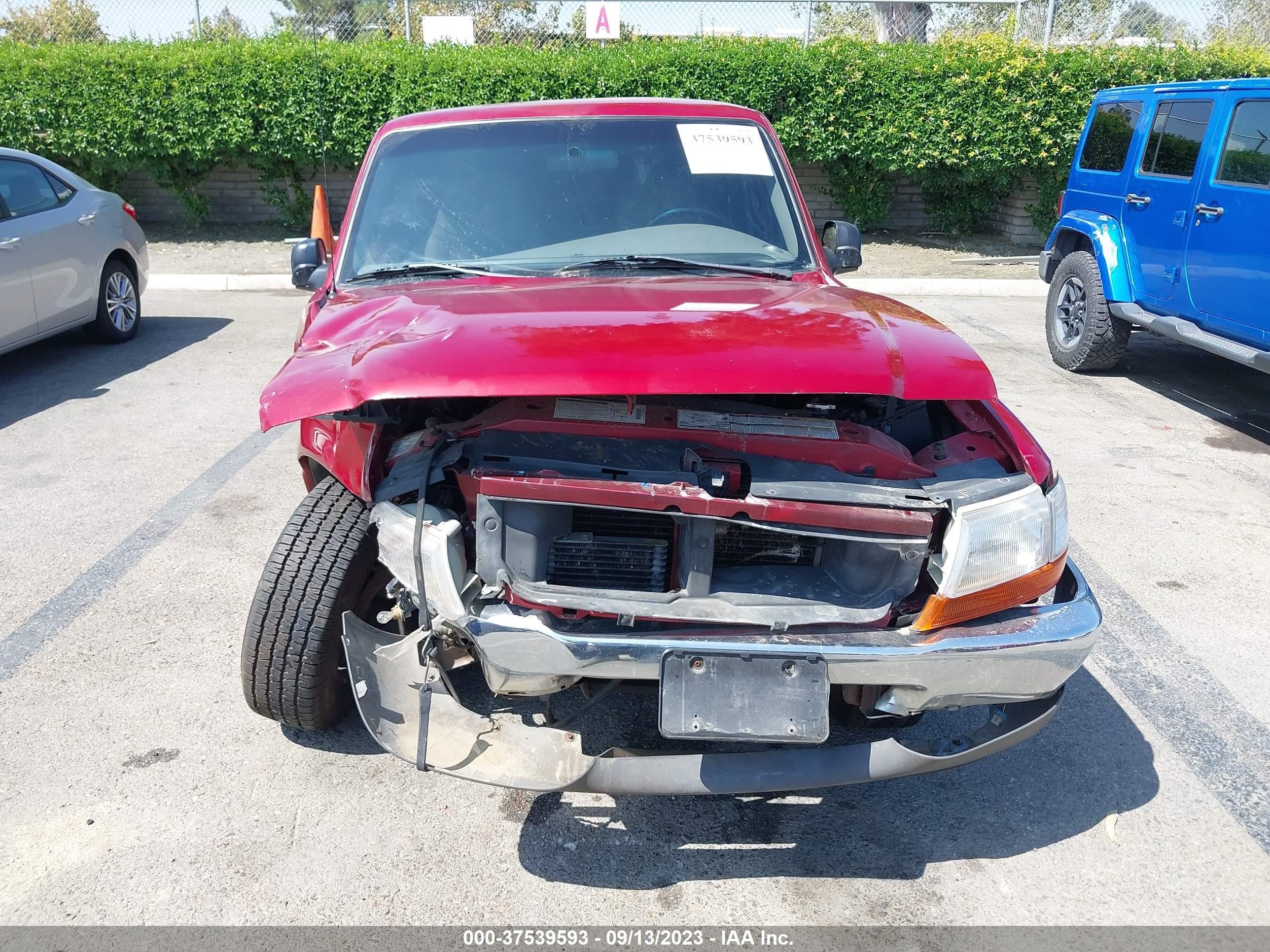 Photo 12 VIN: 1FTYR14V7YPC08884 - FORD RANGER 