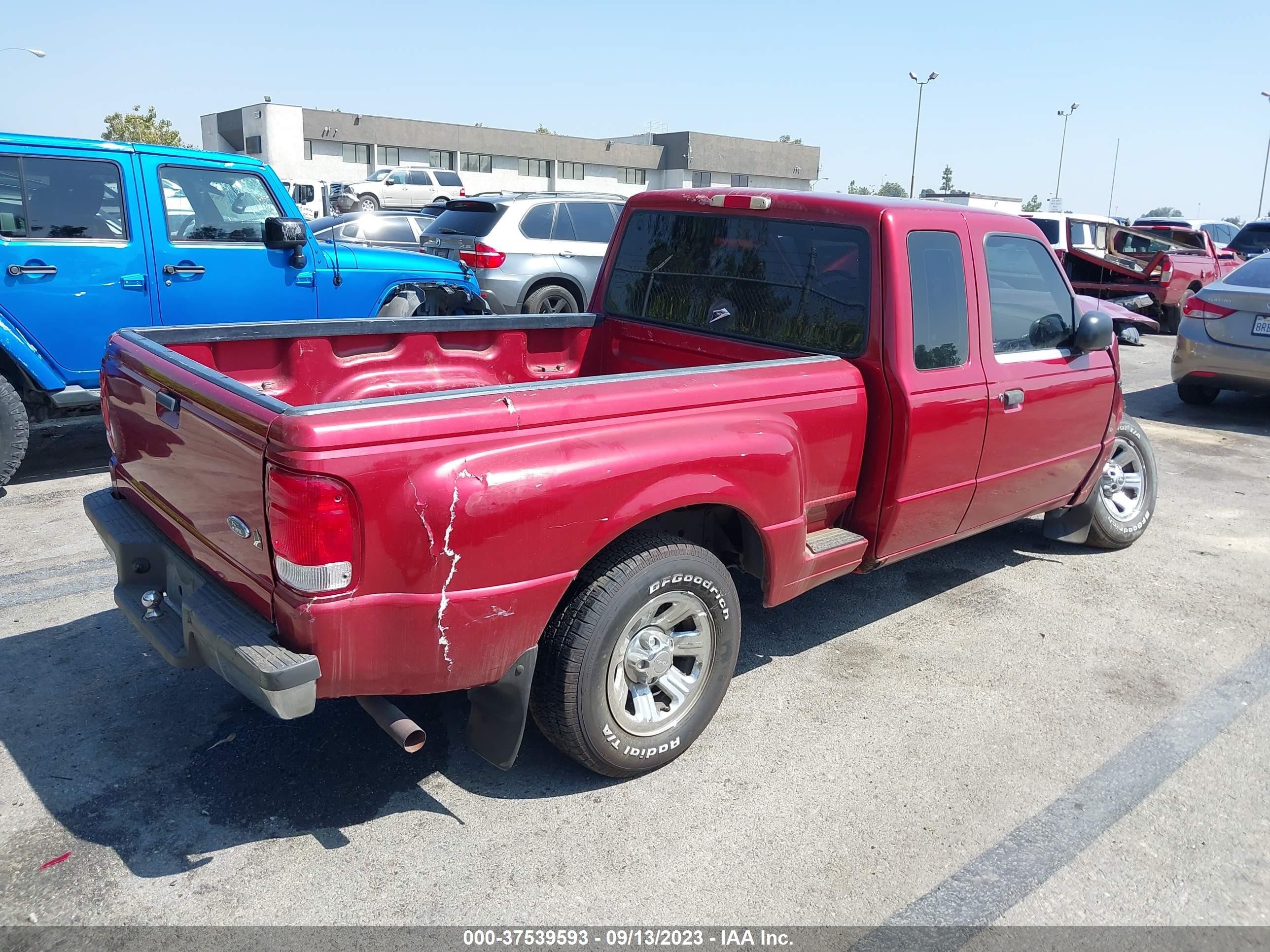 Photo 3 VIN: 1FTYR14V7YPC08884 - FORD RANGER 