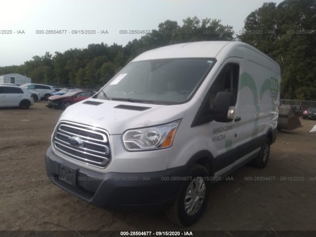 Photo 1 VIN: 1FTYR1CM8GKA28379 - FORD TRANSIT CARGO VAN 