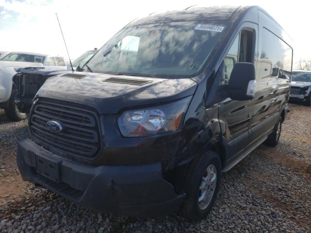 Photo 1 VIN: 1FTYR2CM0FKB28318 - FORD TRANSIT CARGO VAN 