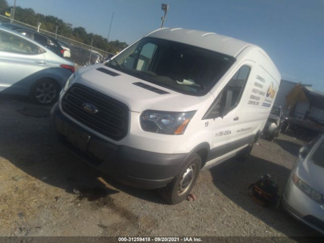 Photo 1 VIN: 1FTYR2CM0GKA71989 - FORD TRANSIT CARGO VAN 