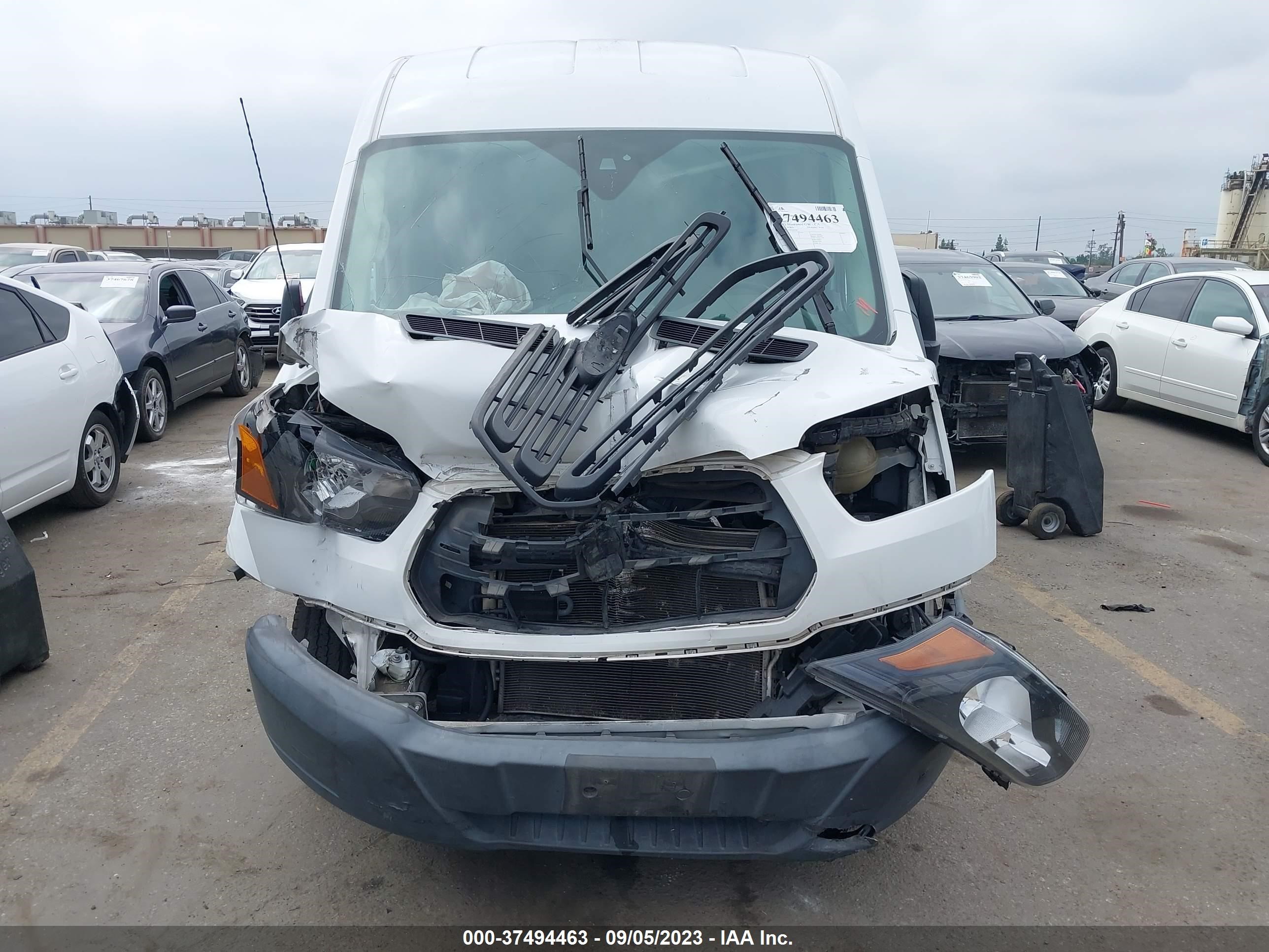 Photo 11 VIN: 1FTYR2CM6HKB49273 - FORD TRANSIT 