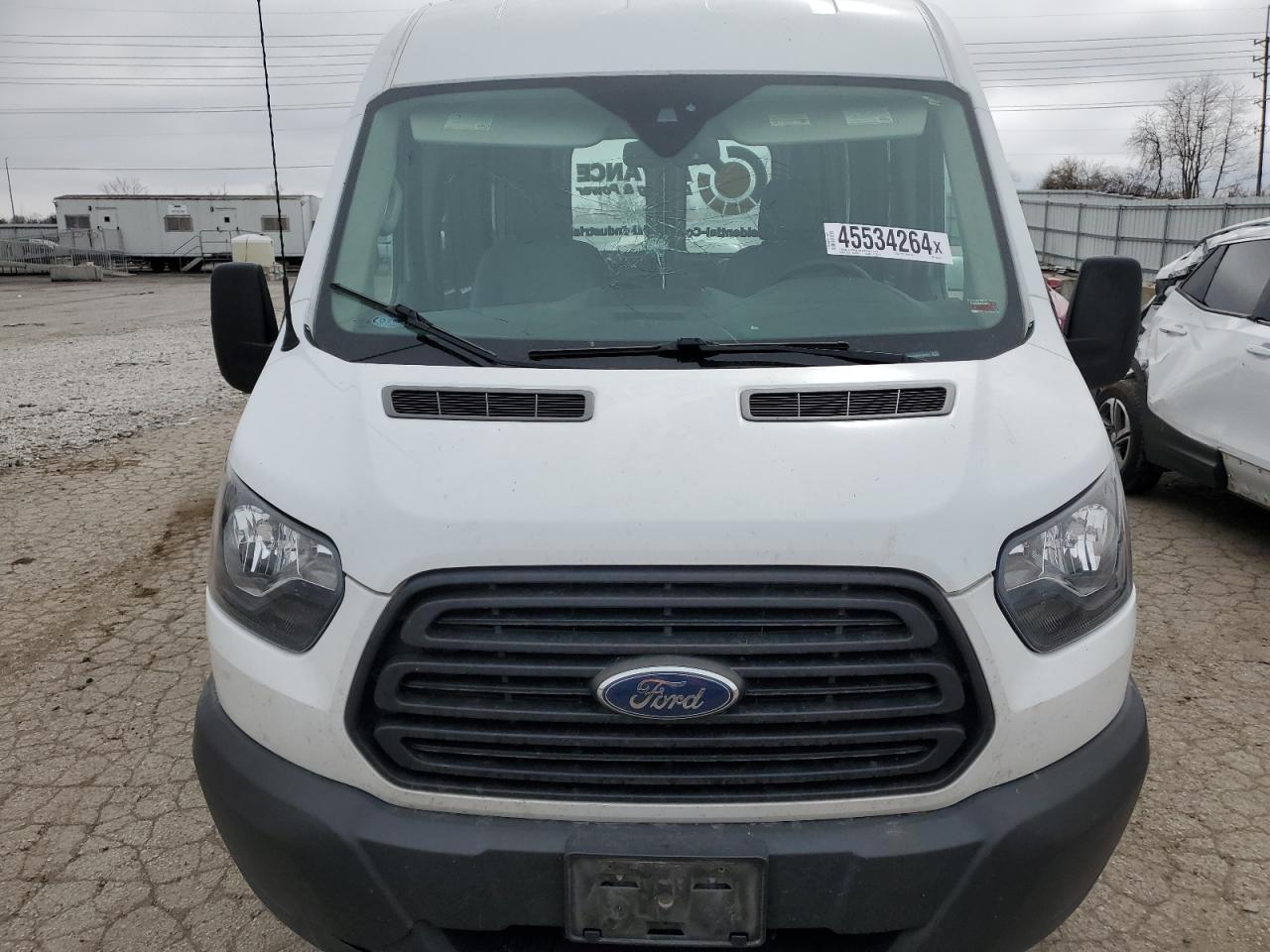 Photo 4 VIN: 1FTYR2CM9KKA93031 - FORD TRANSIT 