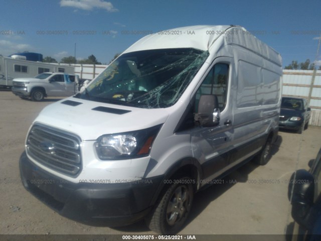 Photo 1 VIN: 1FTYR2XM2JKA72434 - FORD TRANSIT VAN 