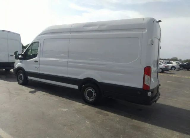 Photo 2 VIN: 1FTYR3XM0GKA88999 - FORD TRANSIT CARGO VAN 