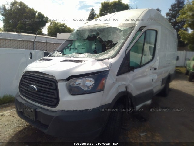 Photo 1 VIN: 1FTYR3XM2JKB03509 - FORD TRANSIT VAN 