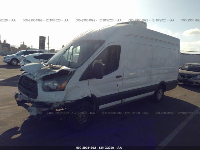 Photo 1 VIN: 1FTYR3XM6GKA61077 - FORD TRANSIT CARGO VAN 