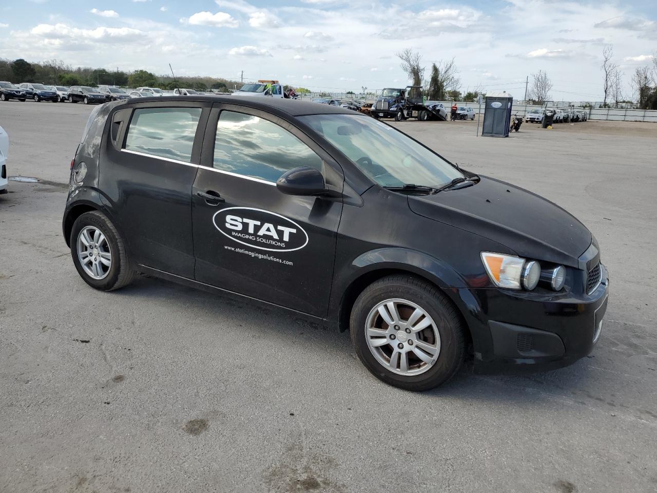 Photo 3 VIN: 1G1JC6SH0C4141609 - CHEVROLET SONIC 