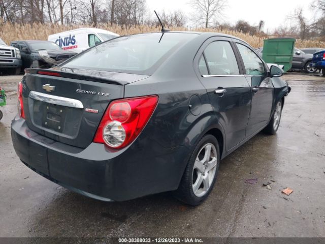 Photo 3 VIN: 1G1JE5SB4E4228321 - CHEVROLET SONIC 