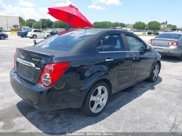 Photo 3 VIN: 1G1JE5SB4F4103577 - CHEVROLET SONIC 