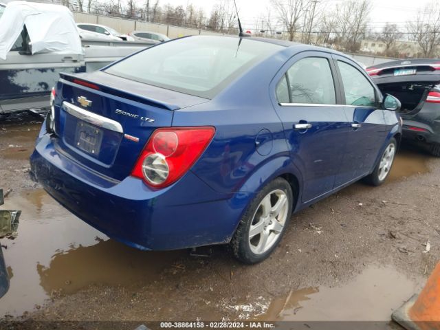 Photo 3 VIN: 1G1JE5SB5E4176536 - CHEVROLET SONIC 