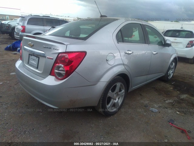 Photo 3 VIN: 1G1JE5SB9G4142313 - CHEVROLET SONIC 