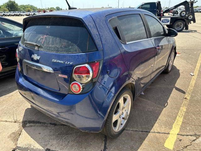 Photo 3 VIN: 1G1JE6SB9E4113557 - CHEVROLET SONIC 