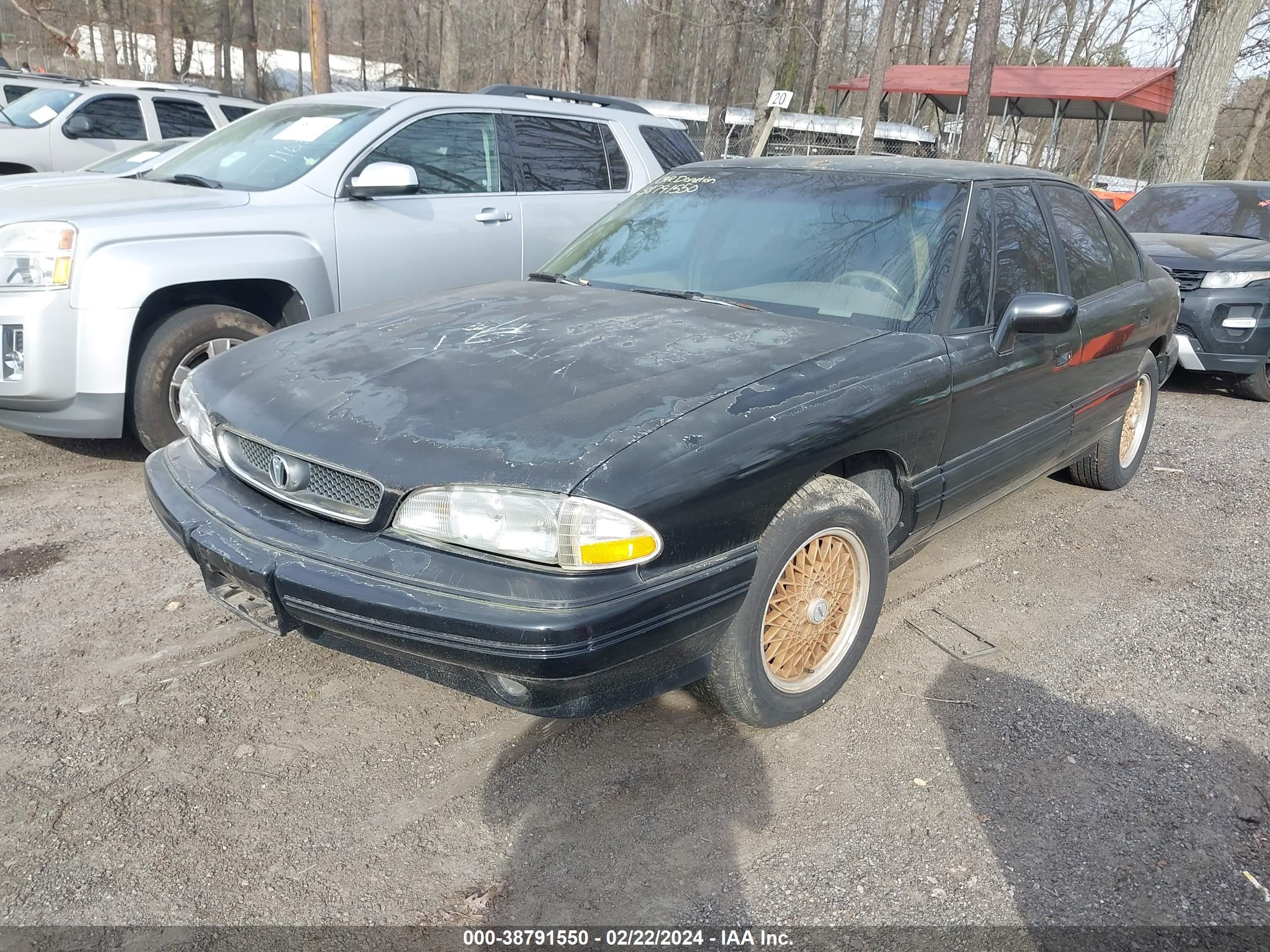 Photo 1 VIN: 1G2HX52L5R4219114 - PONTIAC BONNEVILLE 