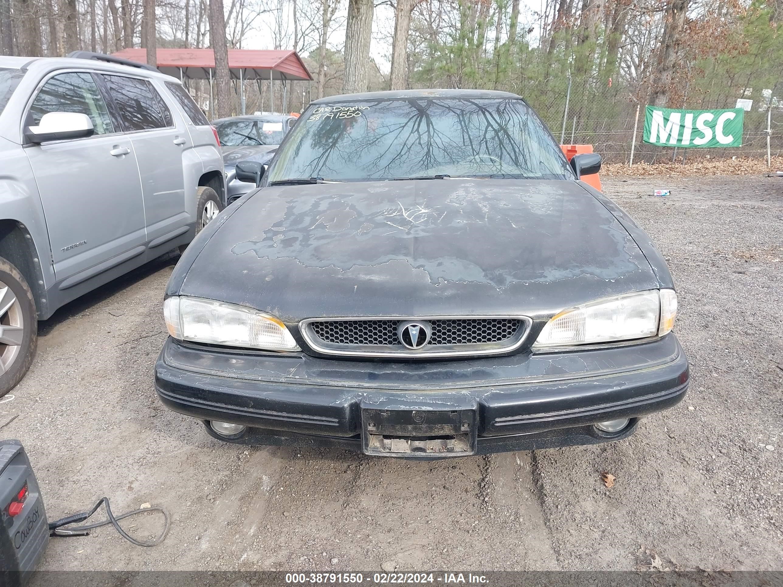 Photo 5 VIN: 1G2HX52L5R4219114 - PONTIAC BONNEVILLE 