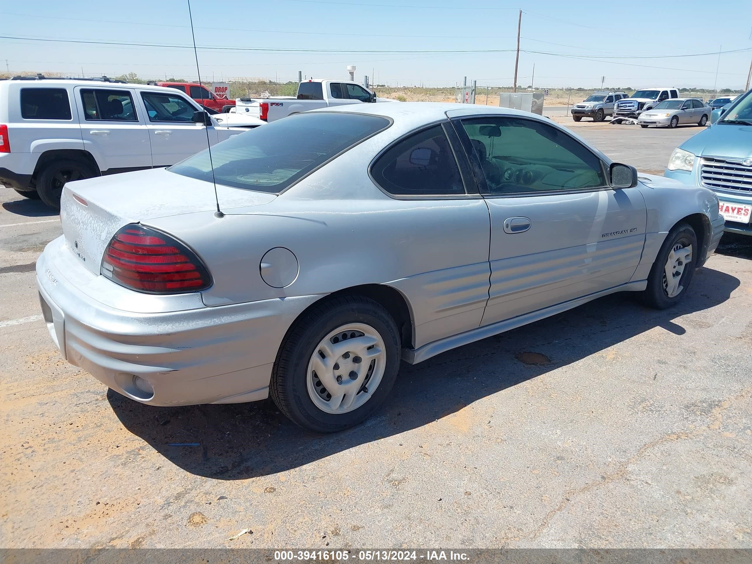 Photo 3 VIN: 1G2NE12T7XM935382 - PONTIAC GRAND AM 