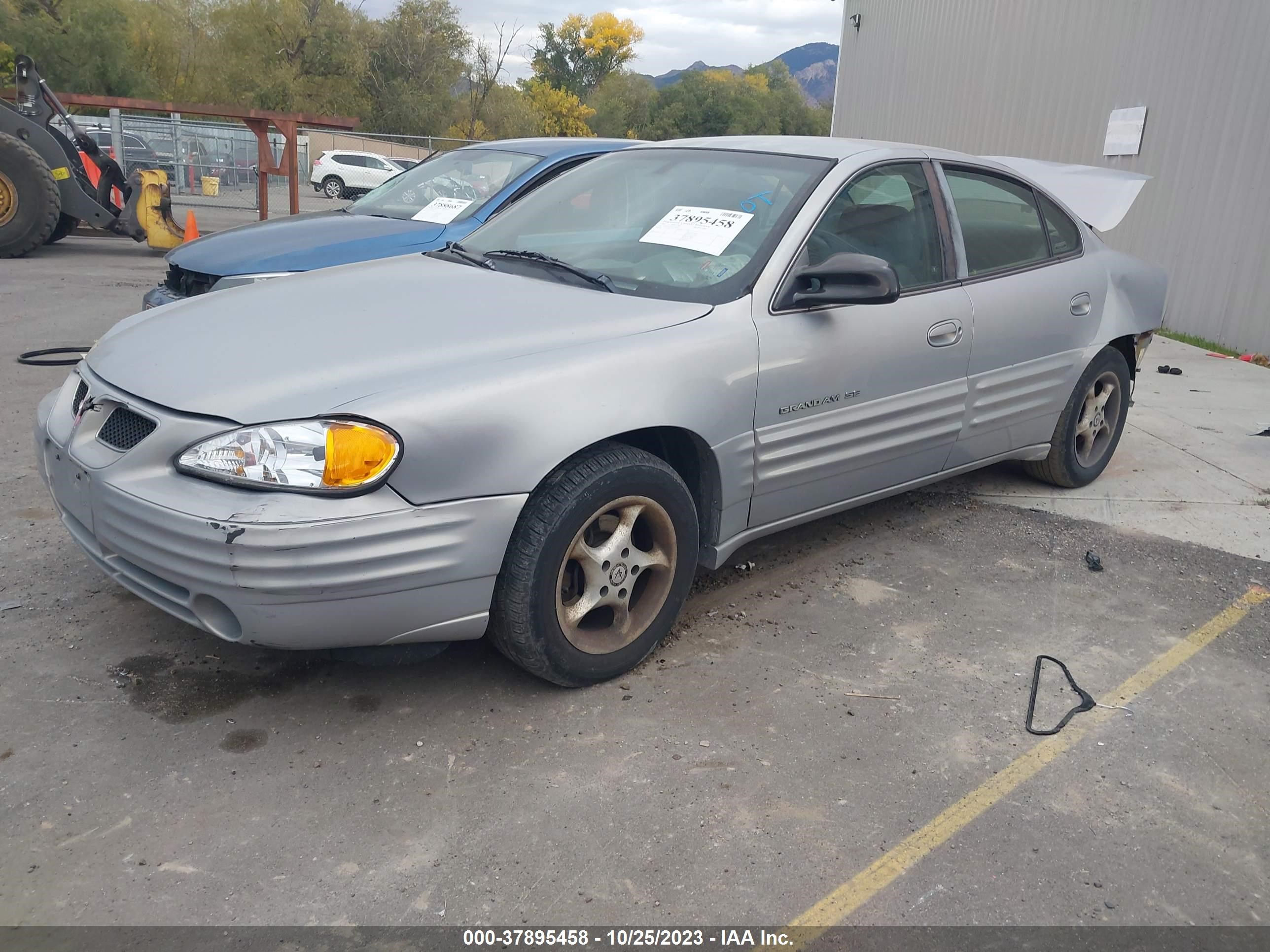 Photo 1 VIN: 1G2NE52T1XC529420 - PONTIAC GRAND AM 