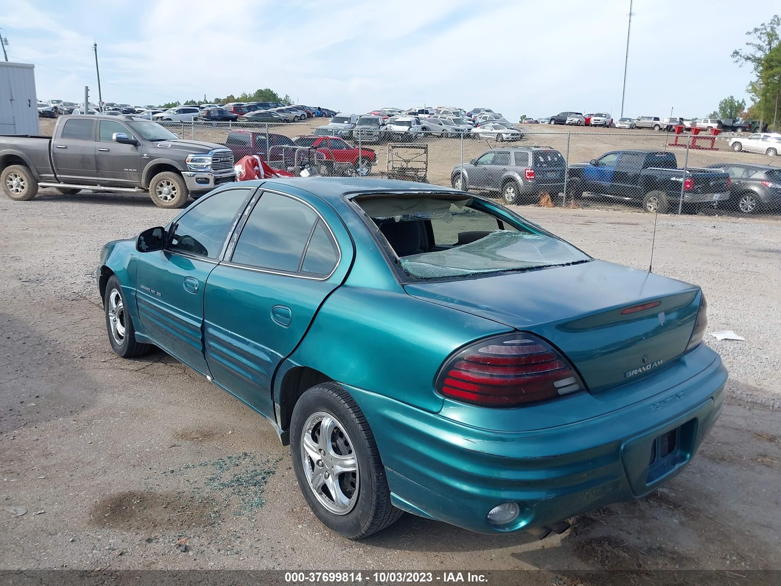 Photo 5 VIN: 1G2NE52T3XM899925 - PONTIAC GRAND AM 