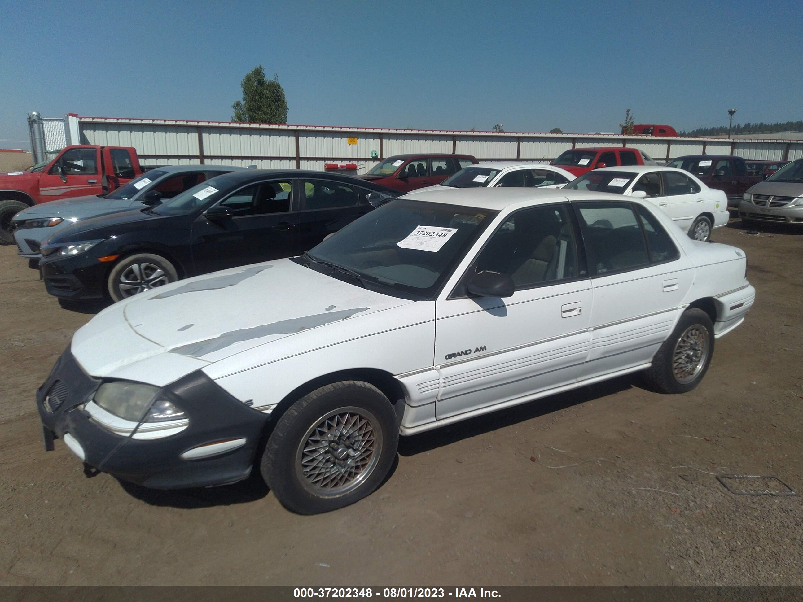 Photo 1 VIN: 1G2NE55M1RC775469 - PONTIAC GRAND AM 