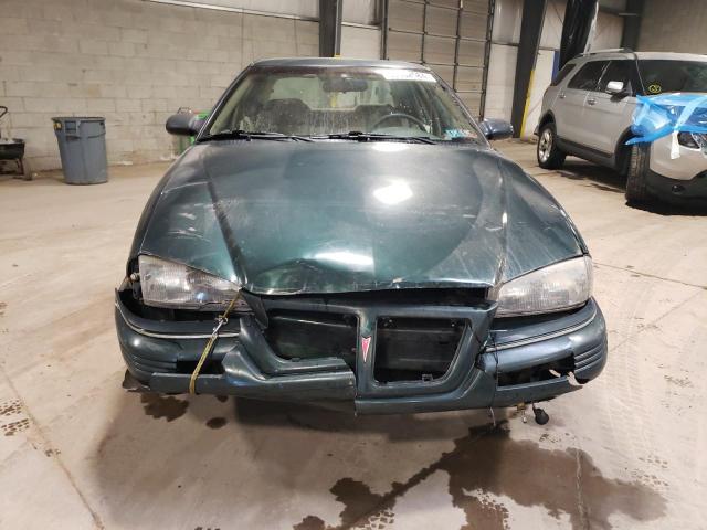 Photo 4 VIN: 1G2NE55MXSC837683 - PONTIAC GRANDAM 