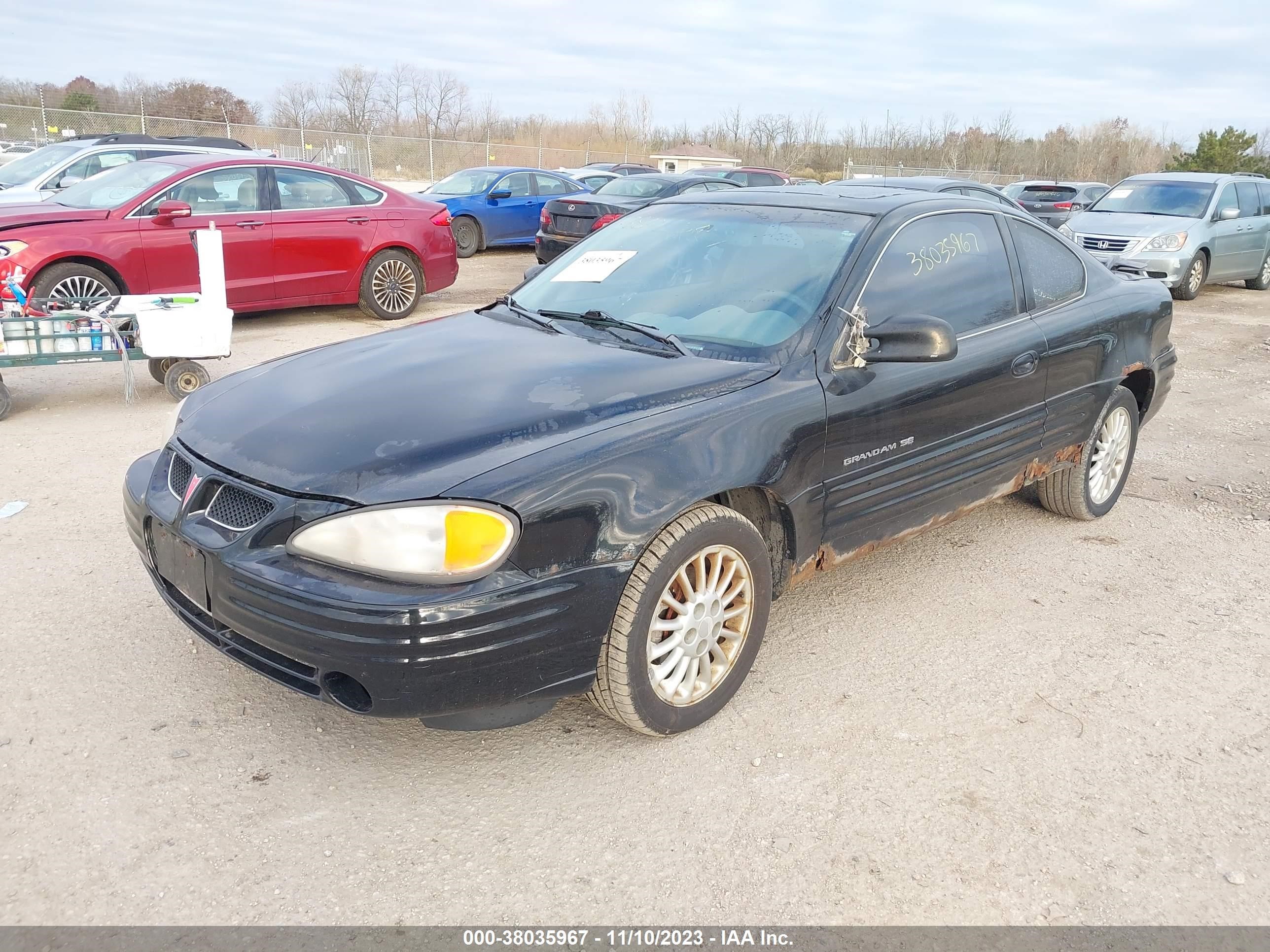 Photo 1 VIN: 1G2NF12T8YM737473 - PONTIAC GRAND AM 