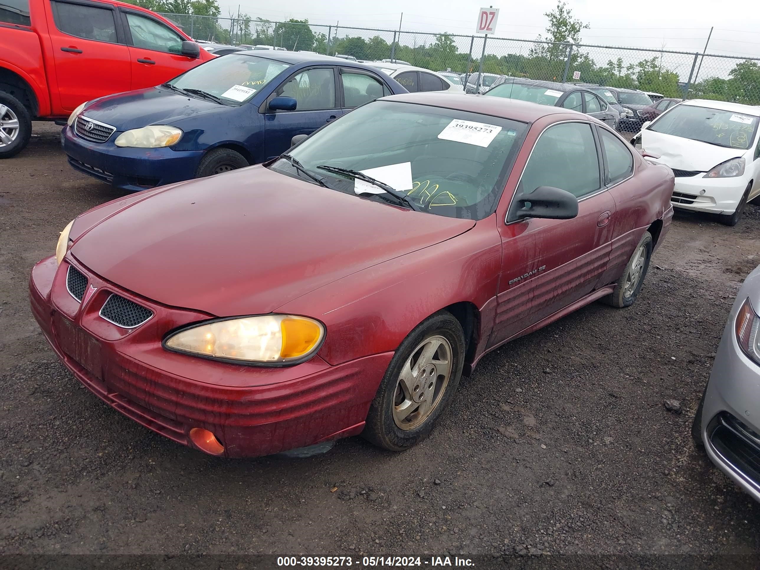 Photo 1 VIN: 1G2NF12T9YM848243 - PONTIAC GRAND AM 