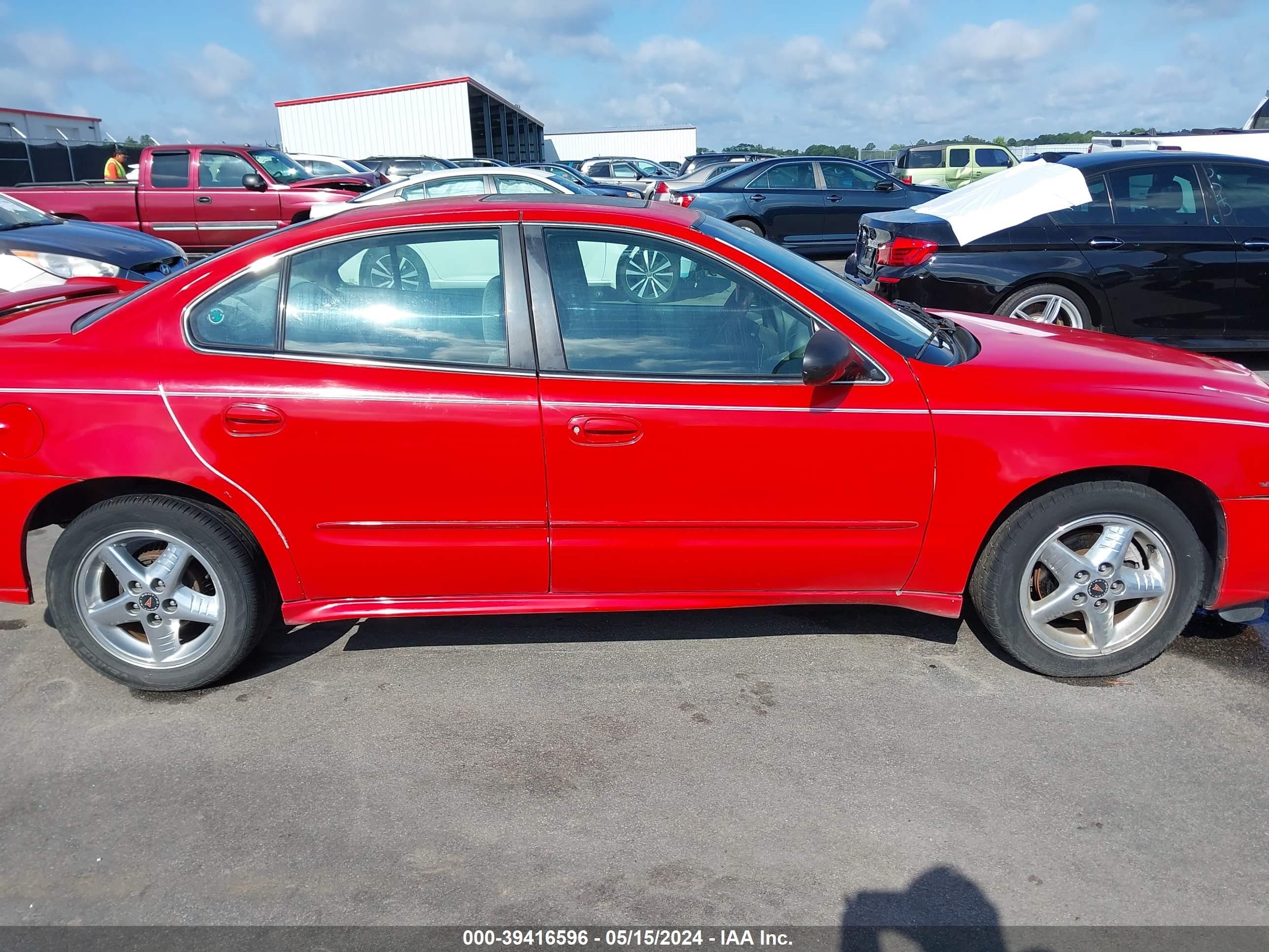 Photo 12 VIN: 1G2NF52E94C200359 - PONTIAC GRAND AM 