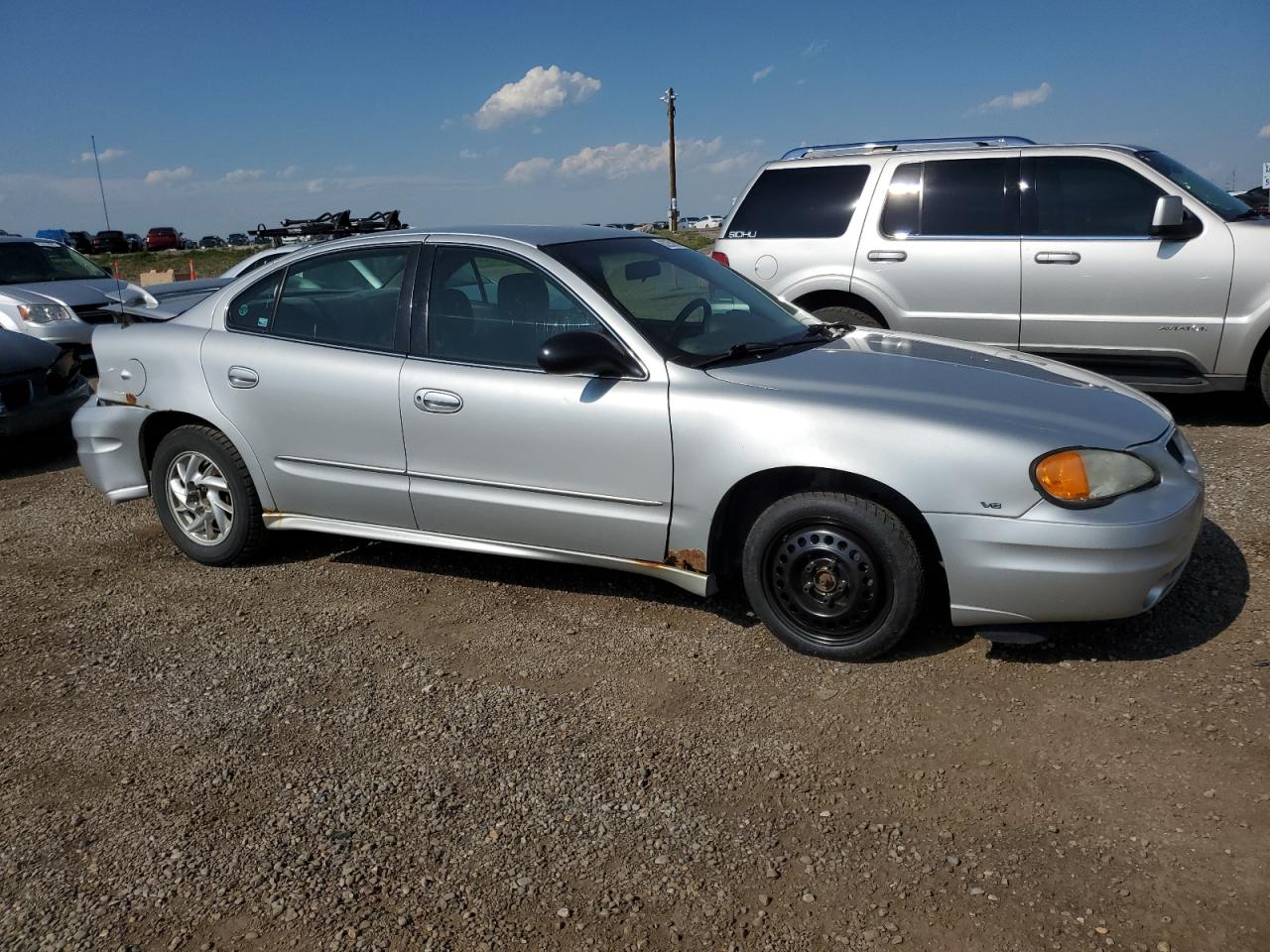 Photo 3 VIN: 1G2NF52EX4C194359 - PONTIAC GRAND AM 