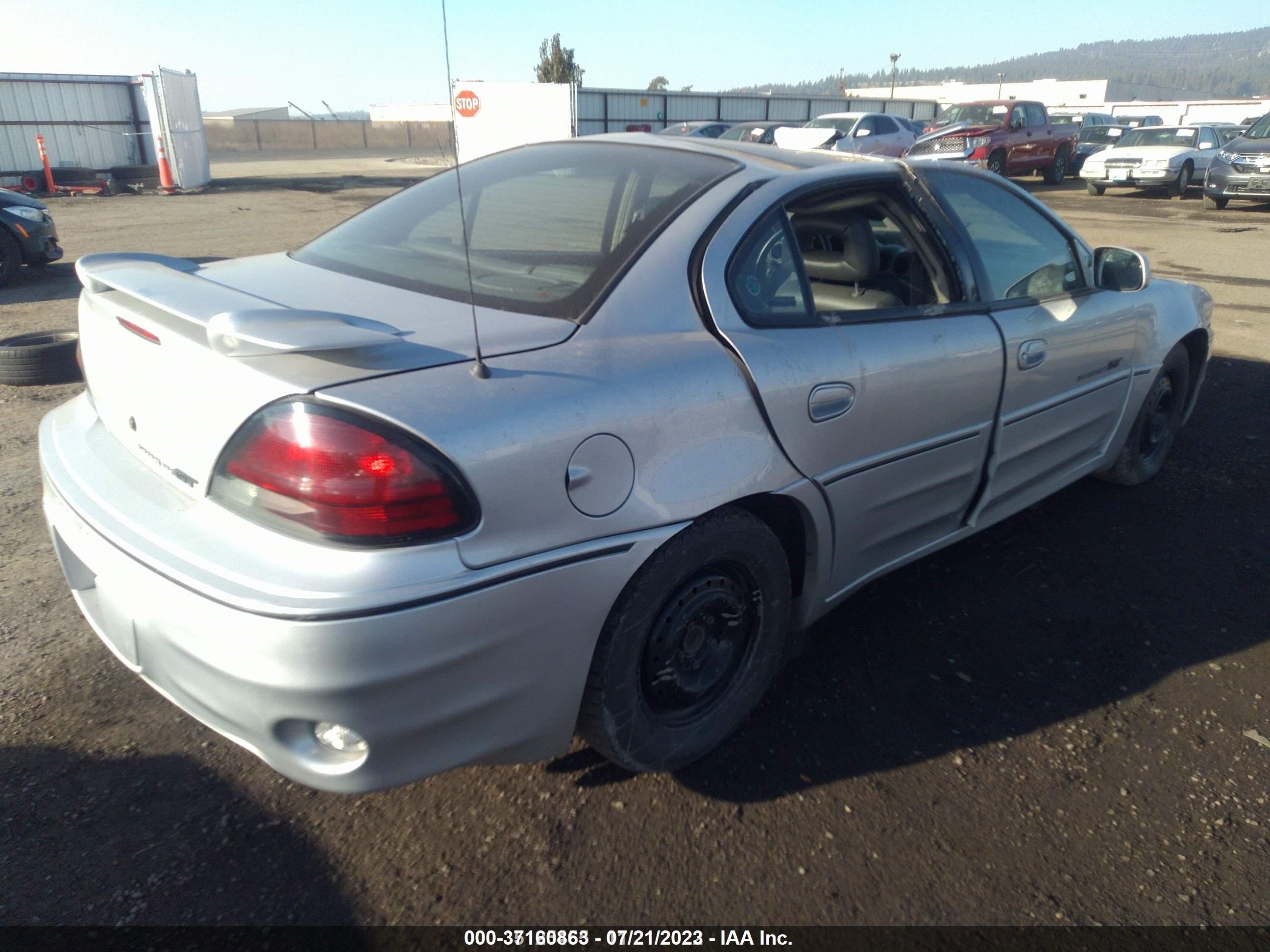 Photo 3 VIN: 1G2NV52E42M520036 - PONTIAC GRAND AM 