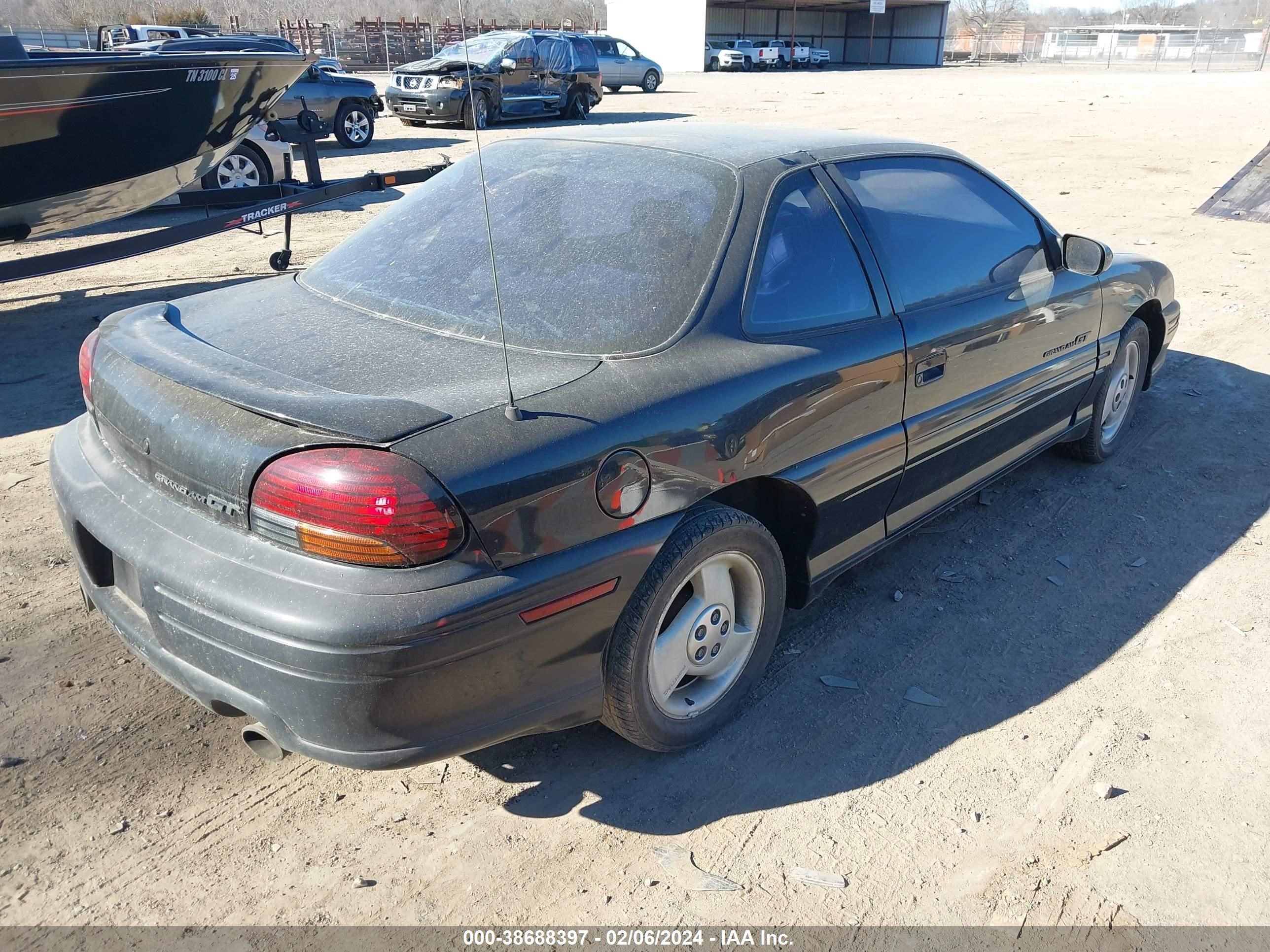 Photo 3 VIN: 1G2NW12T7VC757117 - PONTIAC GRAND AM 