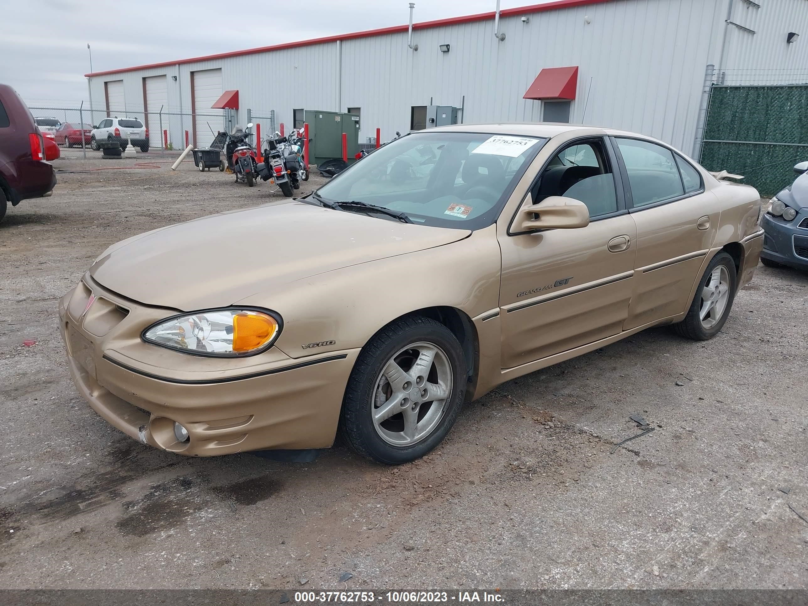 Photo 1 VIN: 1G2NW52E1XM806107 - PONTIAC GRAND AM 