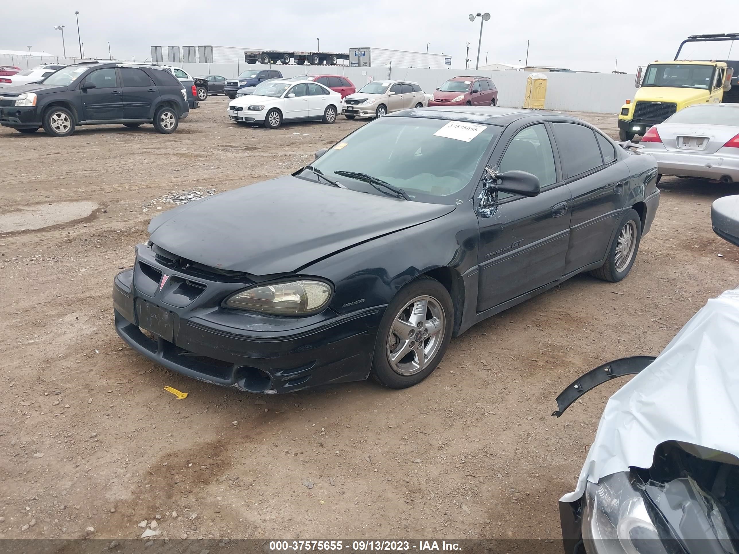 Photo 1 VIN: 1G2NW52E1YM828531 - PONTIAC GRAND AM 