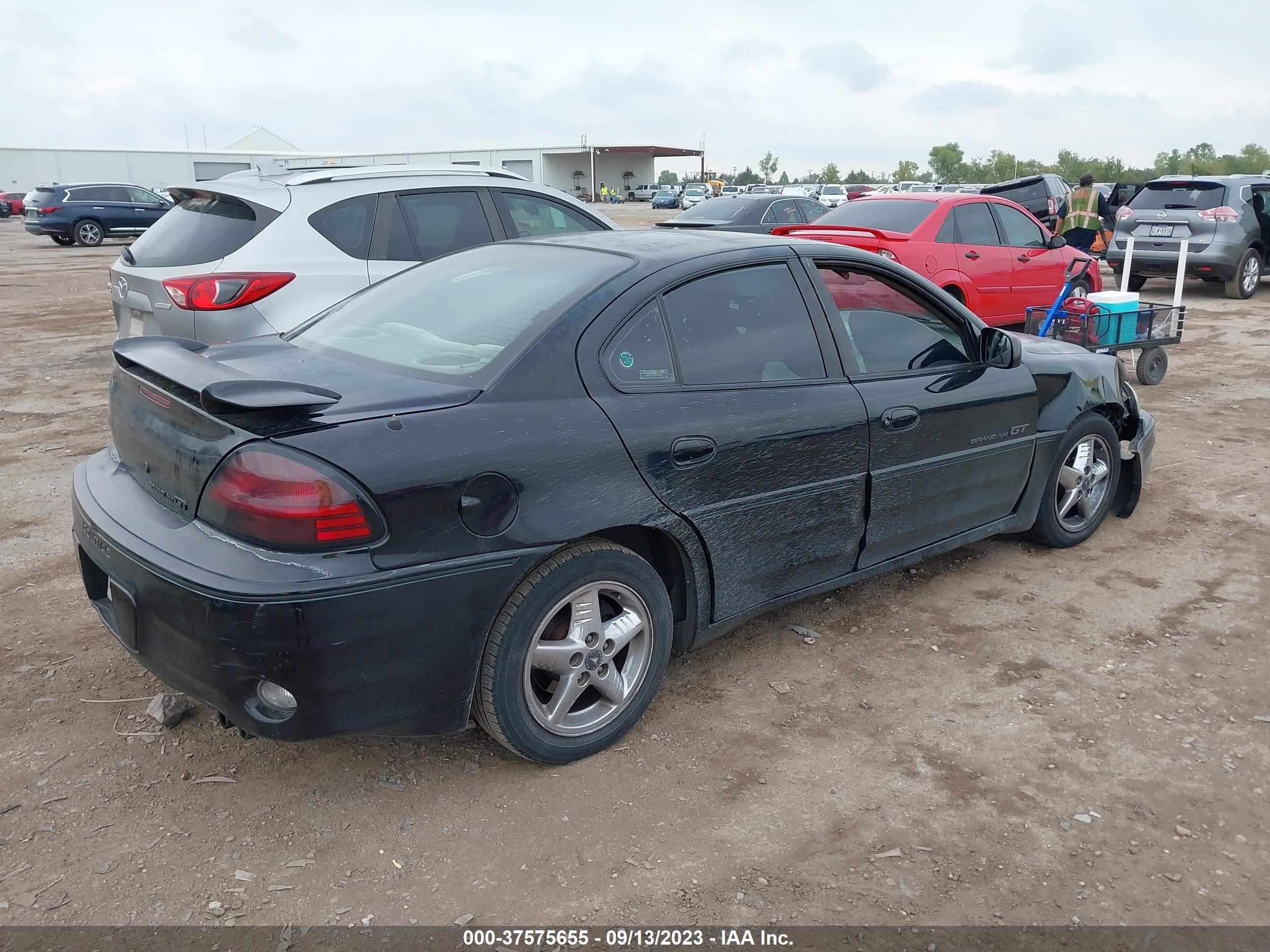 Photo 3 VIN: 1G2NW52E1YM828531 - PONTIAC GRAND AM 