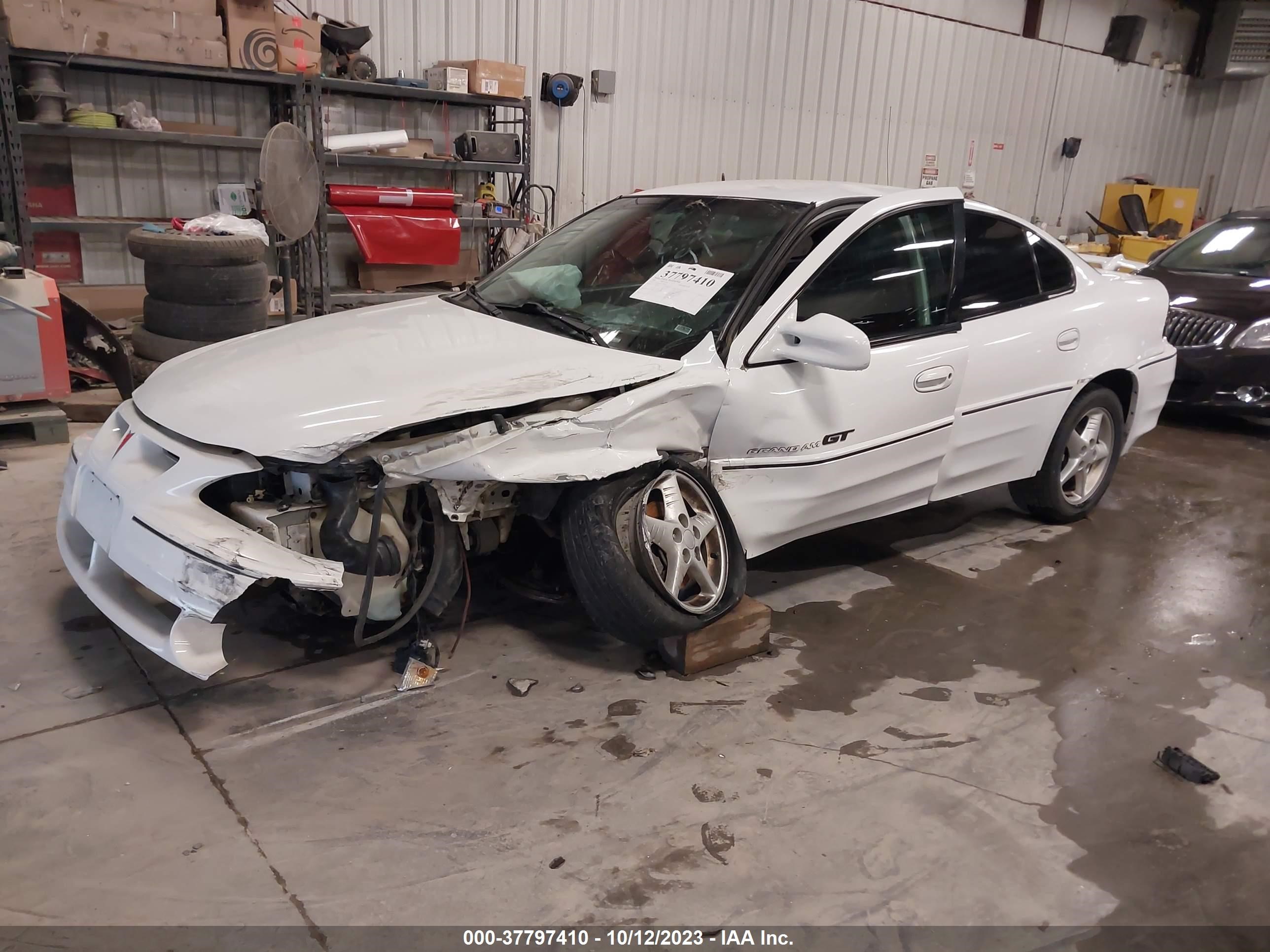 Photo 1 VIN: 1G2NW52E4YM706083 - PONTIAC GRAND AM 