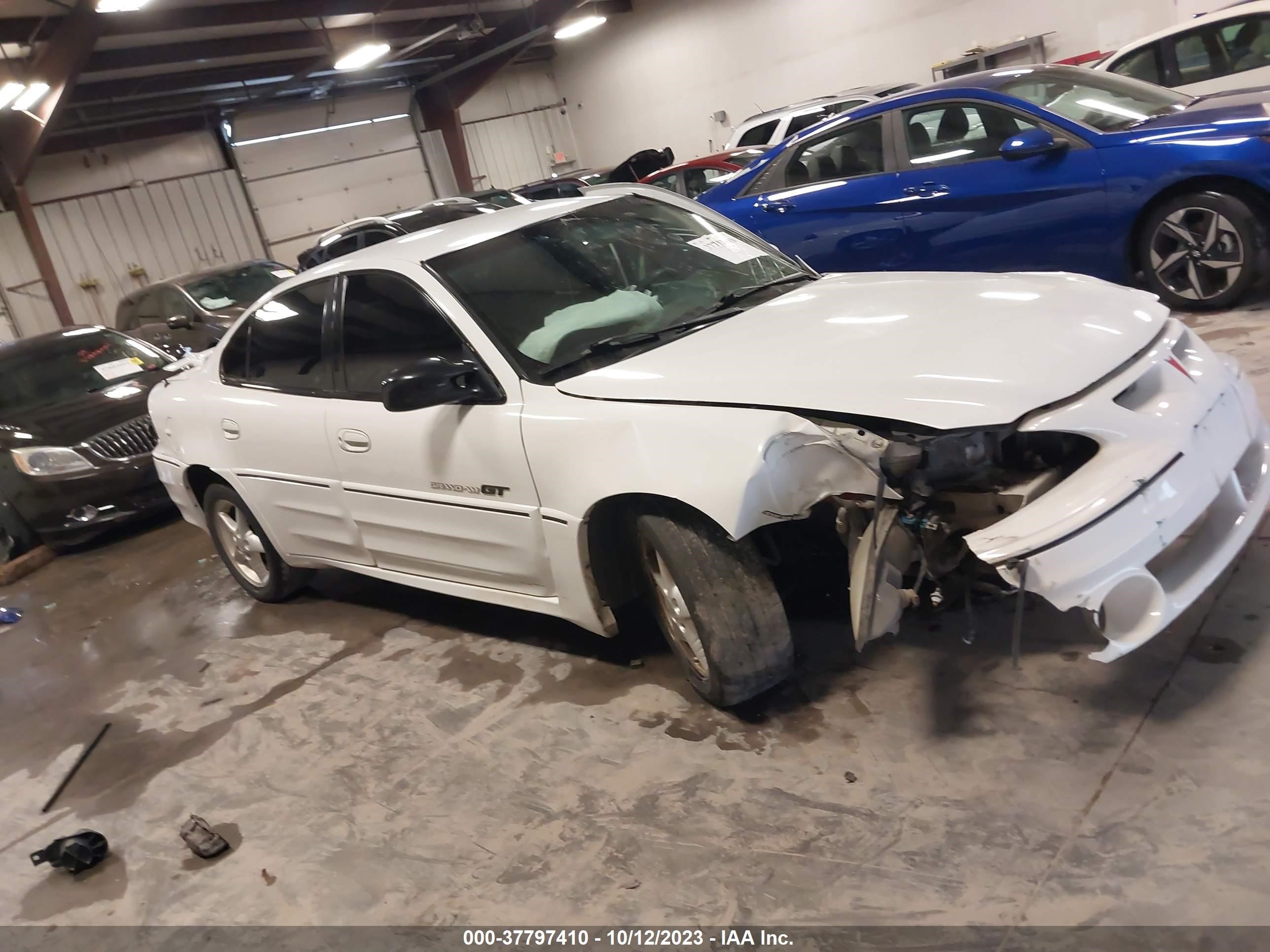 Photo 11 VIN: 1G2NW52E4YM706083 - PONTIAC GRAND AM 