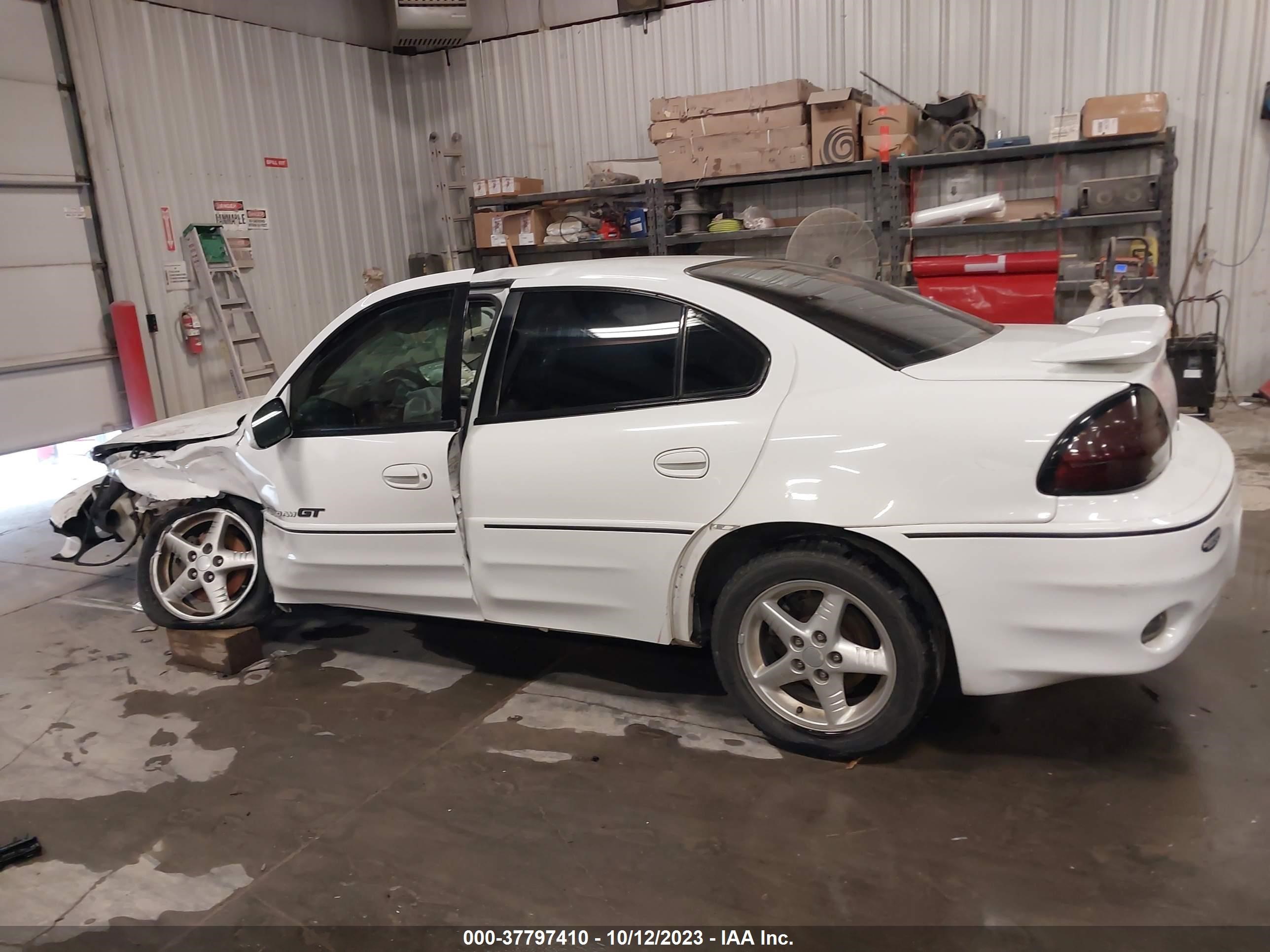 Photo 12 VIN: 1G2NW52E4YM706083 - PONTIAC GRAND AM 