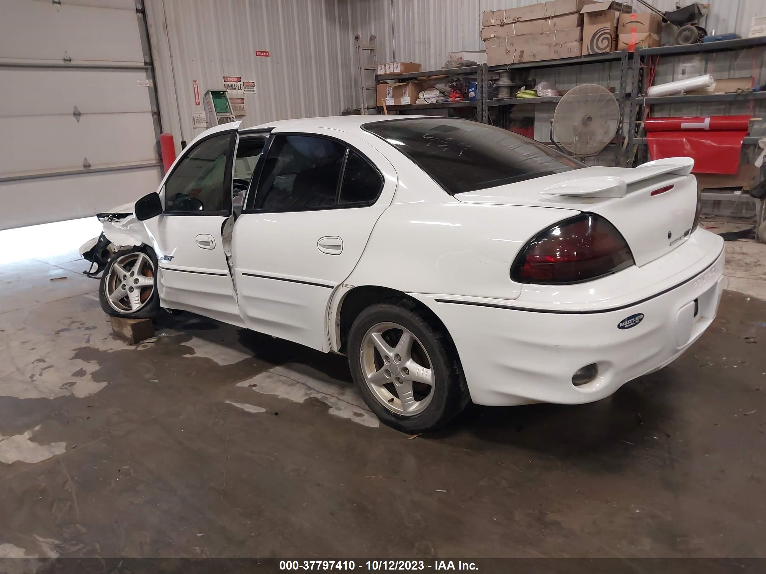 Photo 2 VIN: 1G2NW52E4YM706083 - PONTIAC GRAND AM 